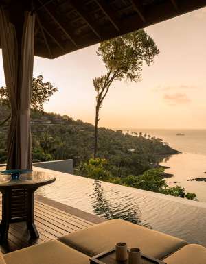 sunset on the deck of a villa at Four Seasons Resort Koh Samui