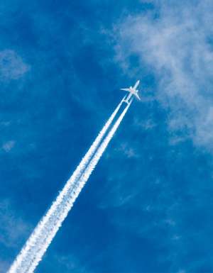 passenger plane leaving slip stream through the air, farting on a plane