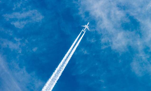 passenger plane leaving slip stream through the air, farting on a plane