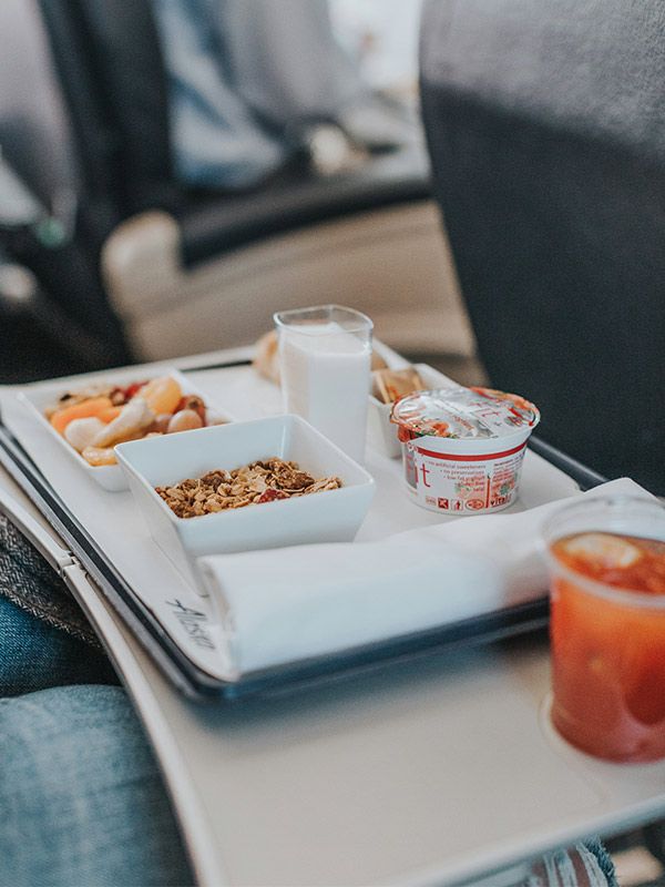 breakfast food being served on a plane