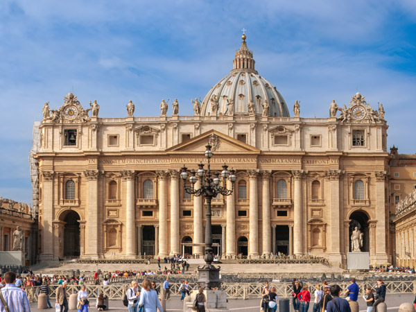 Tourists and Pilgrims at the Papal Basilica of Saint Peter, officially known as Basilica Papale di San Pietro in Vaticano.