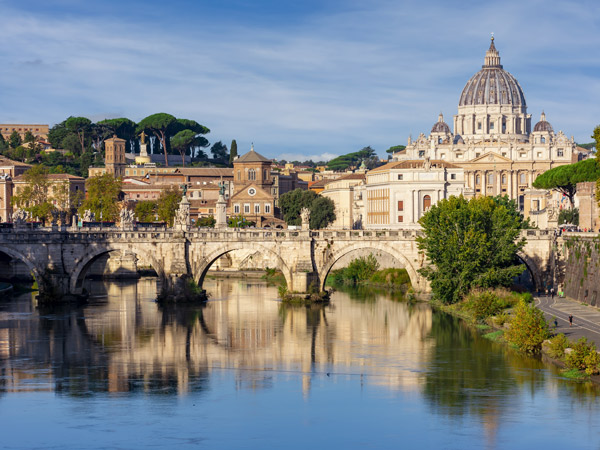 St Peter's basilica in Vatican and Victor Emmanuel II bridge in Rome, Italy