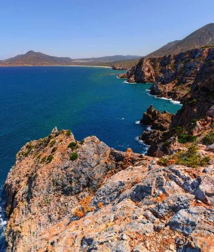 Sardinia is offering free accommodation – but there’s a catch