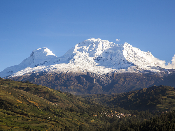 Snow-capped peak of Nevado Huascarán rising above the Peru Highlands.