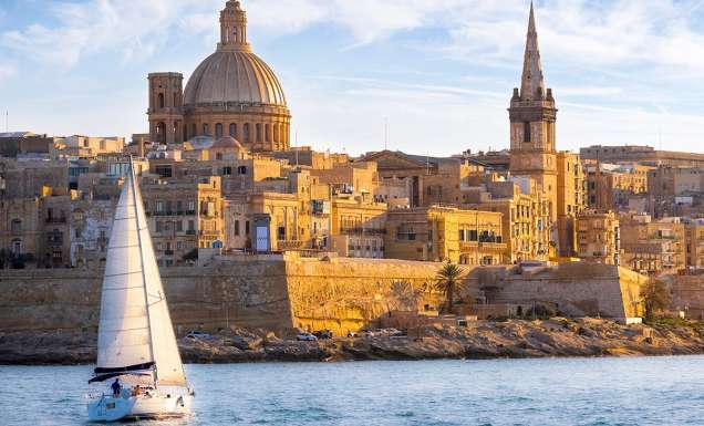 sailboat in front of valetta malta islands