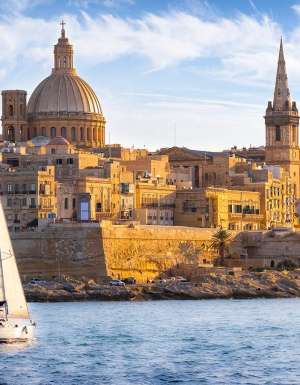 sailboat in front of valetta malta islands