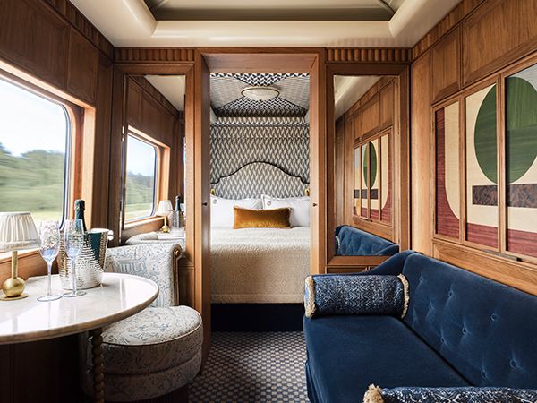 The elegant interior of a luxury sleeper train bedroom from England to Wales in Northern Europe and the UK.