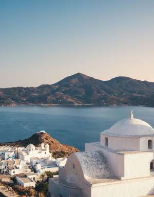 a church on the top of the hill in Milos, Greece