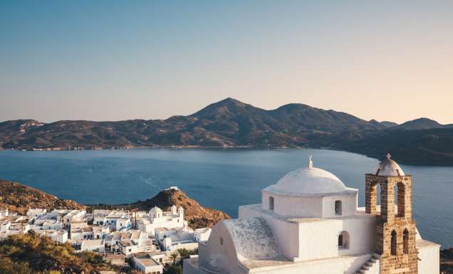 a church on the top of the hill in Milos, Greece