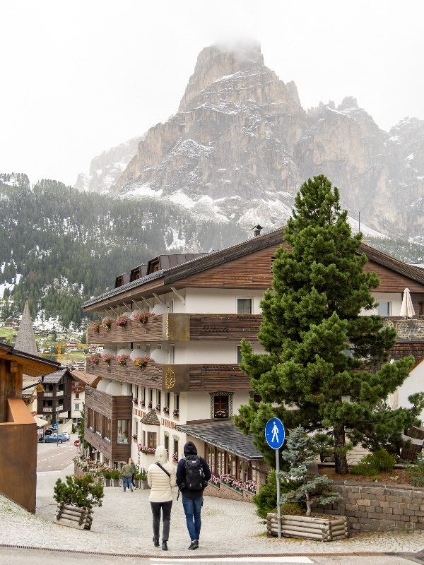 Corvara overshadowed by the Sassongher mountain
