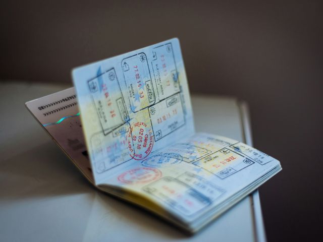 Passport open with stamps