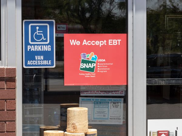 Food stamps sign in a shop, USA