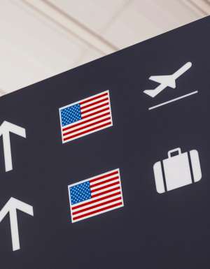 Sign with American flag at airport