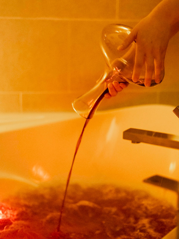 wine being poured into tub
