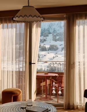View of Swiss Alps covered in snow from inside The Brecon suite