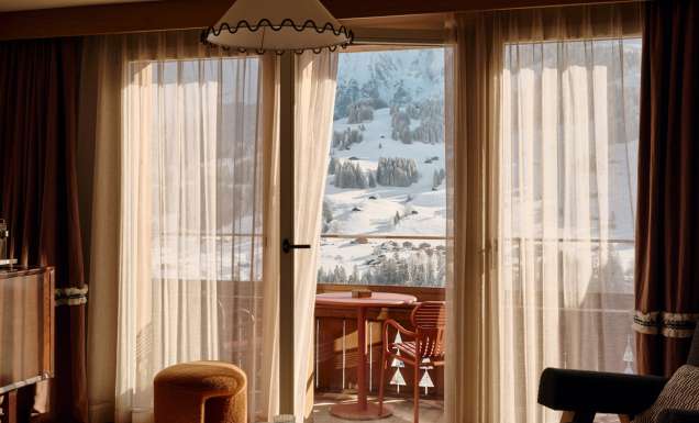 View of Swiss Alps covered in snow from inside The Brecon suite
