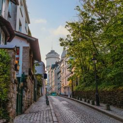 Montmartre Water Tower on a Charming Cobblestone Street in Paris