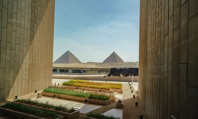 View of Pyramids of Giza from the main viewing platform of the Grand Egyptian Museum