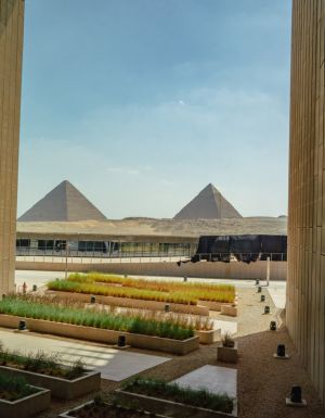 View of Pyramids of Giza from the main viewing platform of the Grand Egyptian Museum