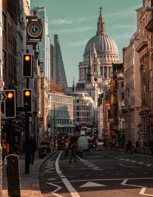 Beautiful view of the busy Fleet Street in London with famous buildings in the background