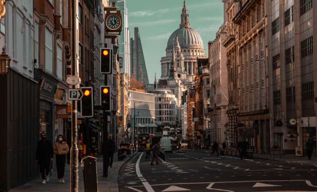 Beautiful view of the busy Fleet Street in London with famous buildings in the background
