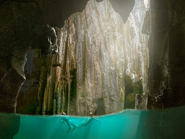 two people swimming in Sawa-I-Lau Caves fiji