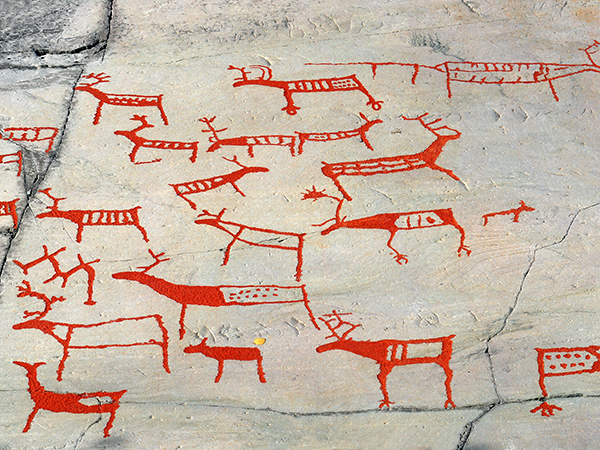 The rock art in Alta, hunting scene, Norway, UNESCO World Heritage Site - prehistoric paintings and stone carvings high in the north of Norway in August 12, 2011