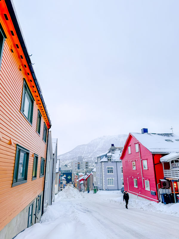 a snow-covered street in Tromsø