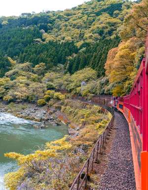 Sagano Romantic Train in japan going over water