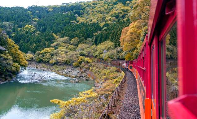 Sagano Romantic Train in japan going over water