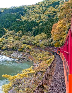Sagano Romantic Train in japan going over water