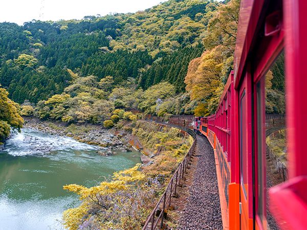 Sagano Romantic Train in japan going over water