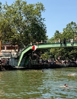 people swimming in the Canal Saint-Martin in Paris