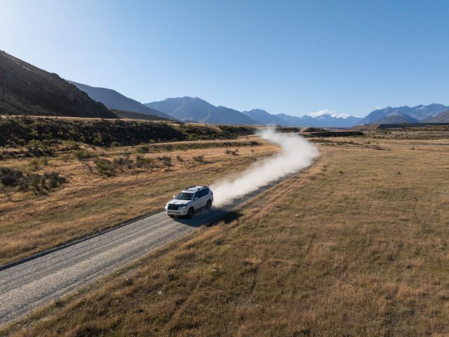 a vehicle driving along South Island, New Zealand