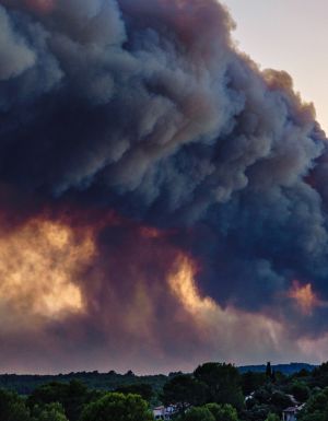 A view from the village of Flayosc (Var) of an impressive plume of smoke rising above Pontevès, where a forest fire has broken out