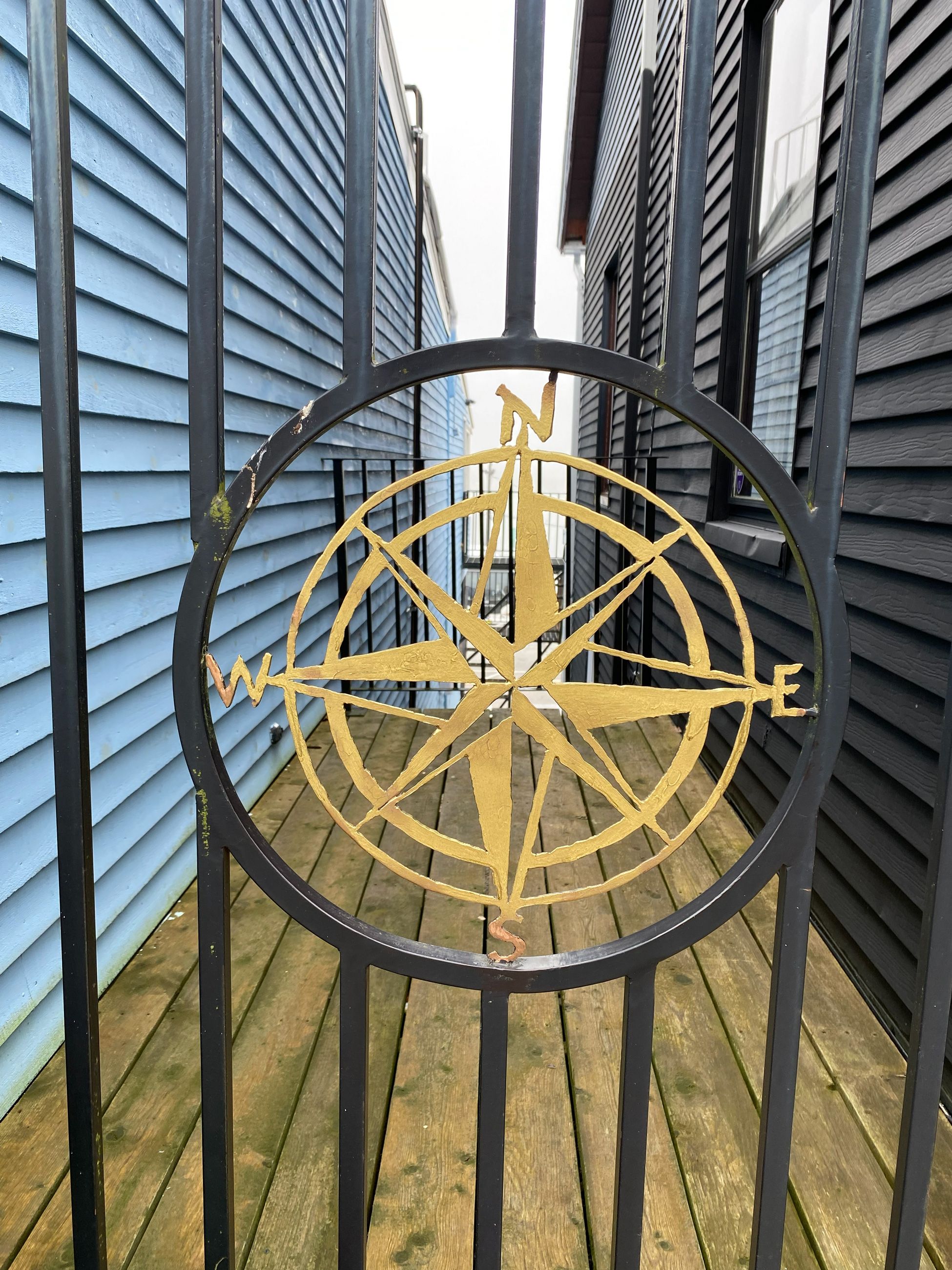 A compass on a fence in Lunenberg