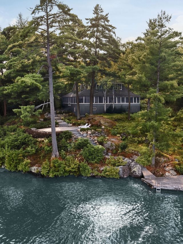 Gordon Bay Cottage nestled beside lake and trees
