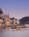The Ama Sonata passing by the Budapest Parliament Building.
