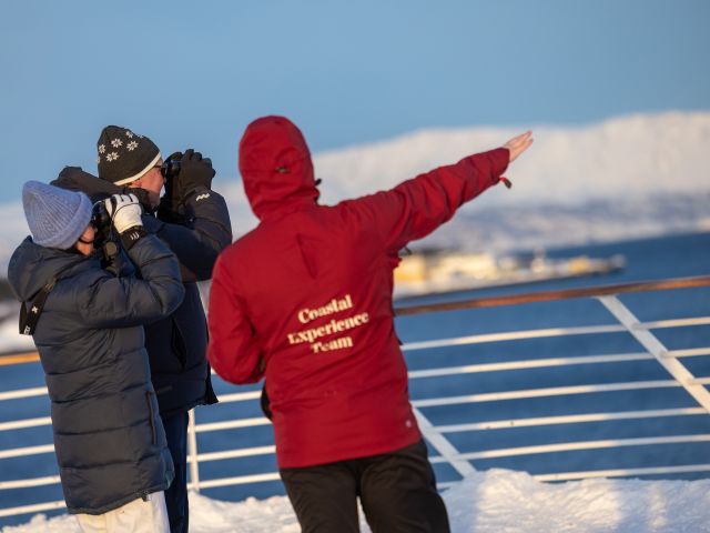guests with hurtigruten expeerience team guide on MS Trollfjord