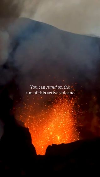 You can stand on the rim of this active volcano
