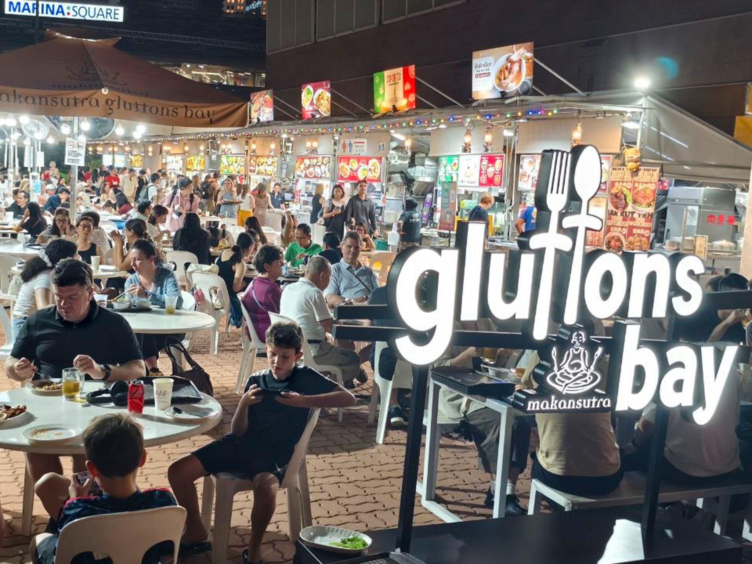 diners at Makansutra Gluttons Bay