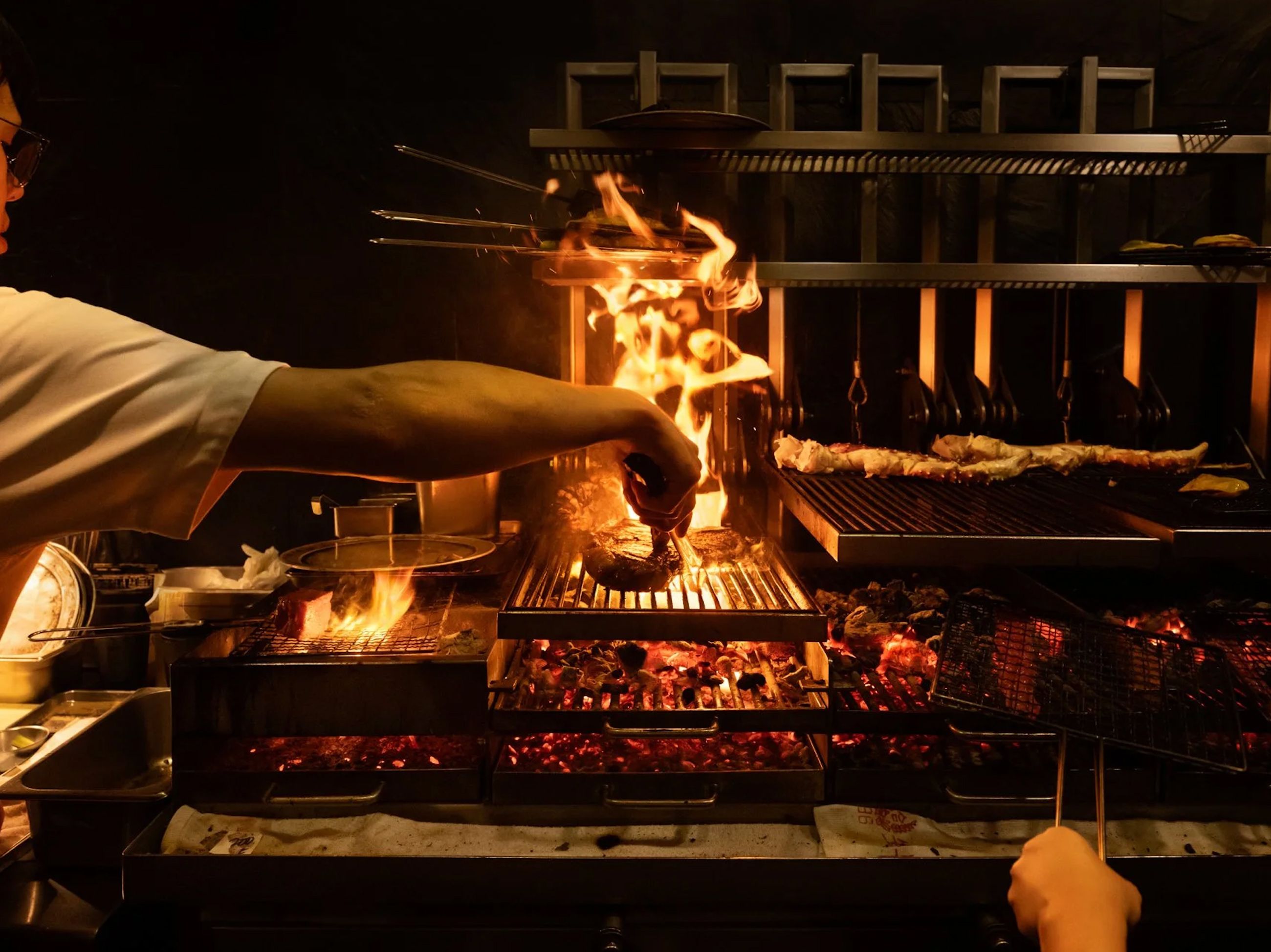 grilling meat at Burnt Ends, Singapore