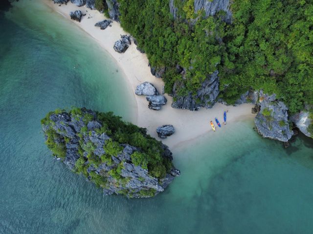 an aerial view of a beach in Hạ Long Bay