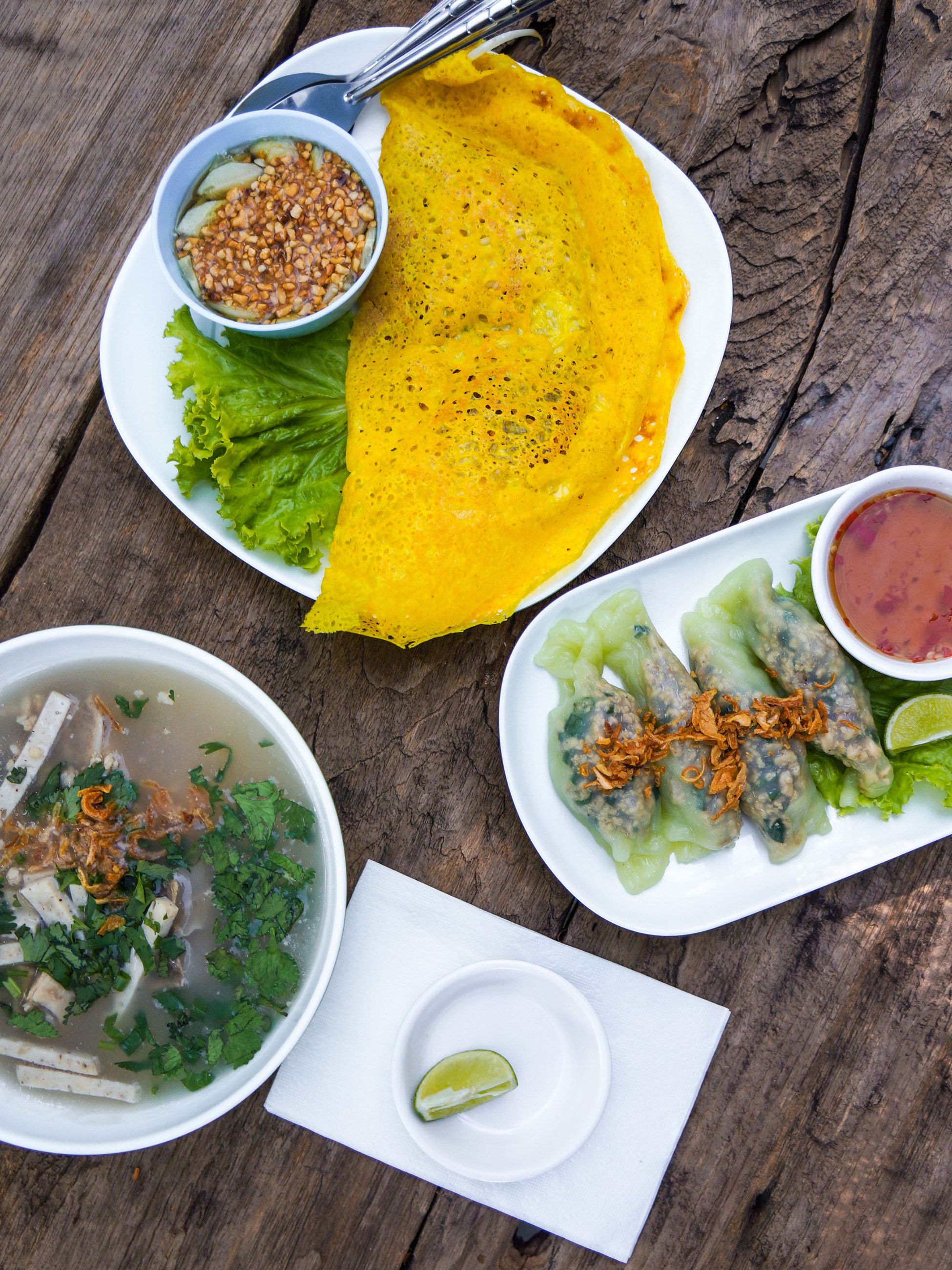 banh xeo, soup, and spring rolls