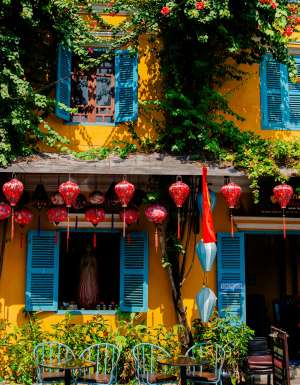 a colourful building with lanterns in Hoi An